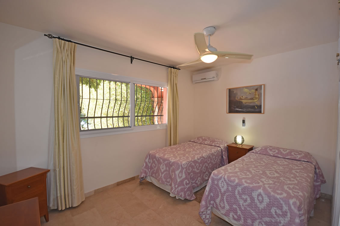 Bedroom Three Overlooks the Swimming Pool